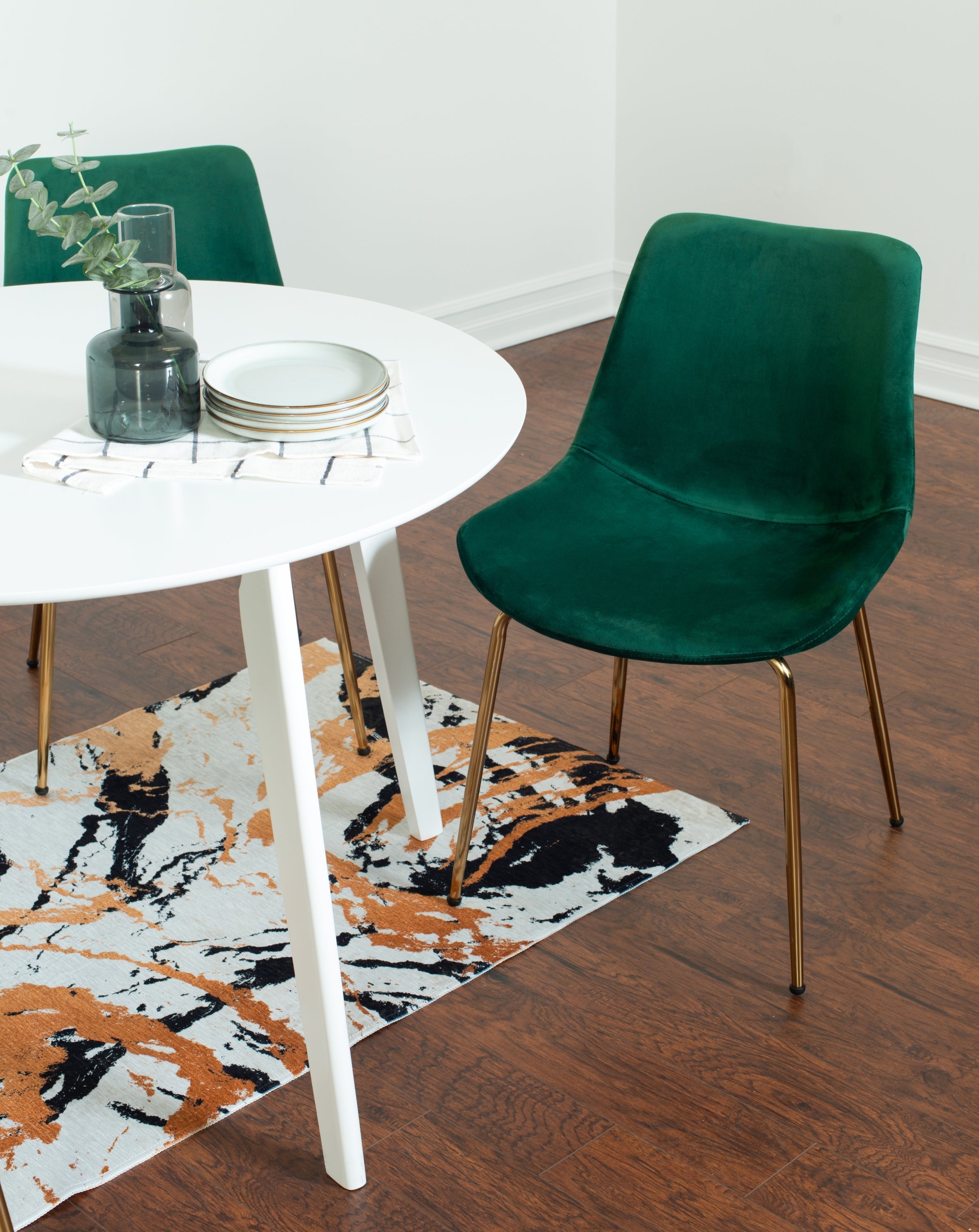 Contemporary White Round Dining Table with Two Gold-Accent Chairs